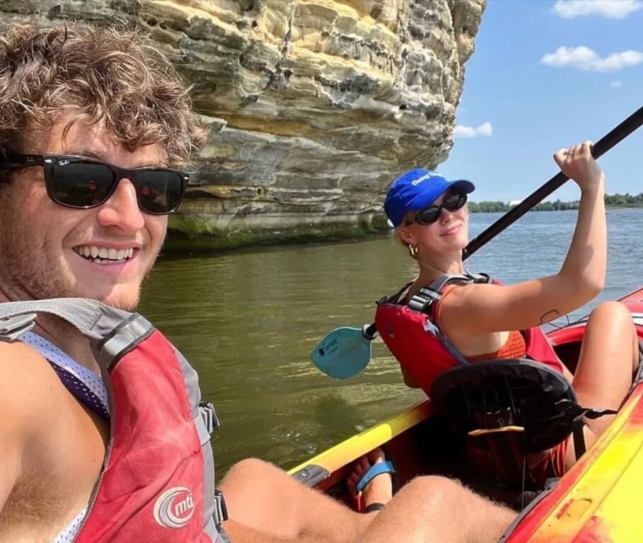 Family enjoying outdoor activities at Starved Rock State Park, including kayaking and picnicking